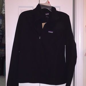 Black fleece pullover jacket